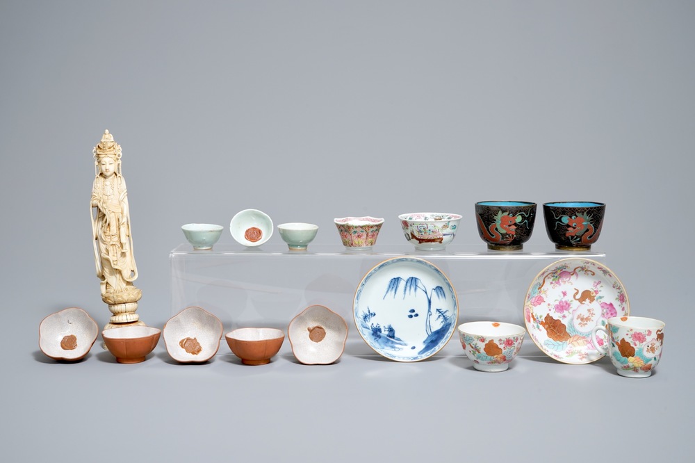A varied group of Chinese cups and saucers and an ivory figure, Yongzheng and later